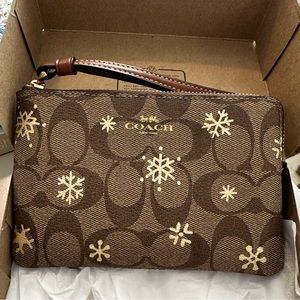 Brand new! Coach leather wristlet